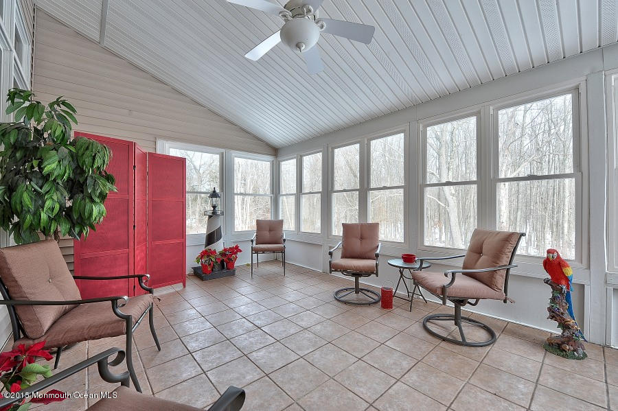33 Larrison Road Wrightstown, NJ 08562 - Photo 18 of 35 a living room with furniture and a potted plant