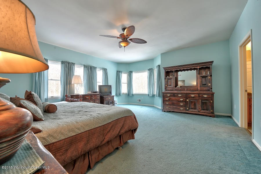 33 Larrison Road Wrightstown, NJ 08562 - Photo 20 of 35 a bedroom with bed and window