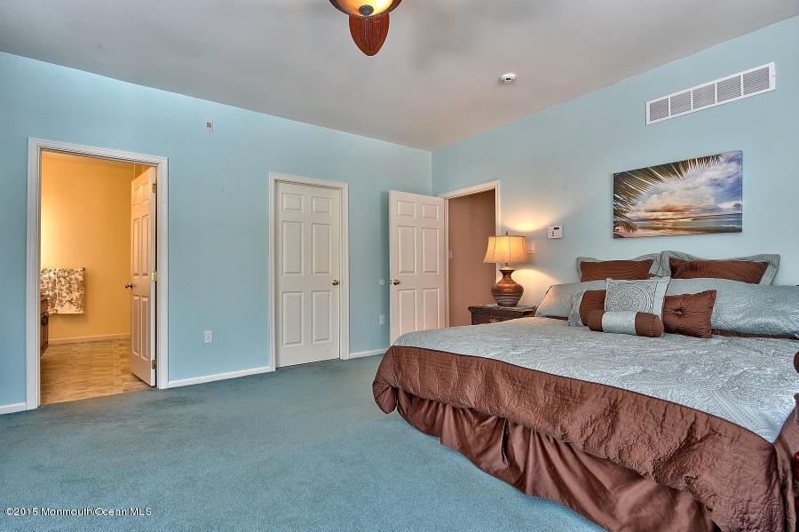 33 Larrison Road Wrightstown, NJ 08562 - Photo 21 of 35 a bedroom with a bed and painting on the wall