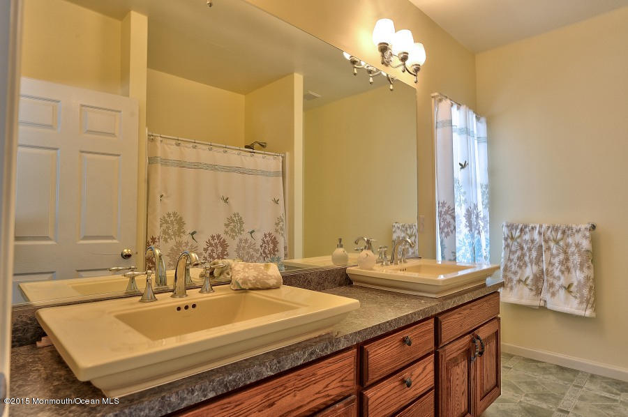 33 Larrison Road Wrightstown, NJ 08562 - Photo 23 of 35 a bathroom with a double vanity sink mirror and double