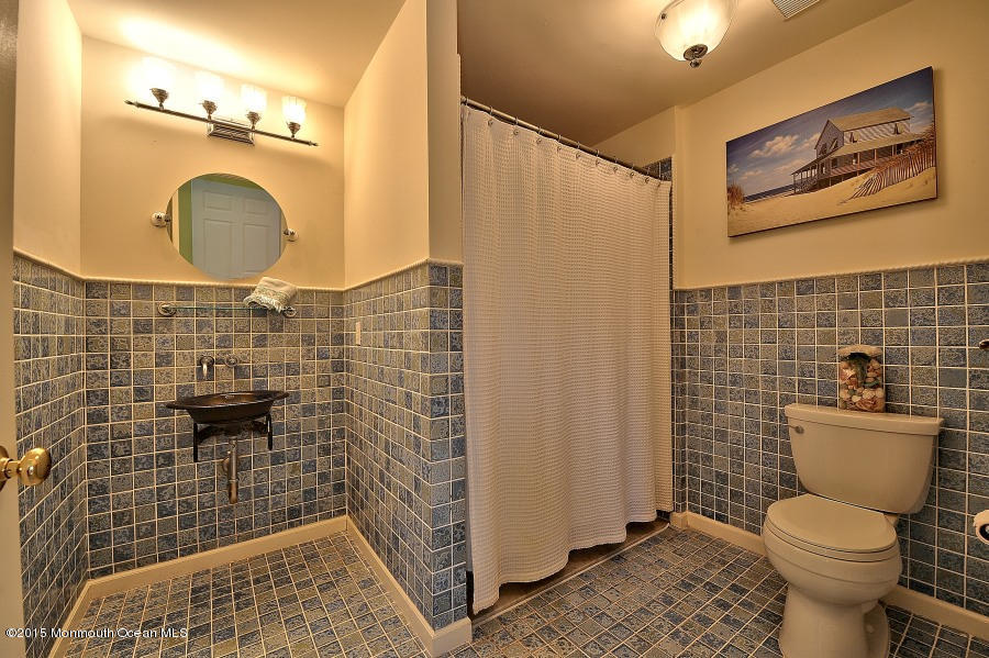 33 Larrison Road Wrightstown, NJ 08562 - Photo 29 of 35 a bathroom with a toilet and a shower