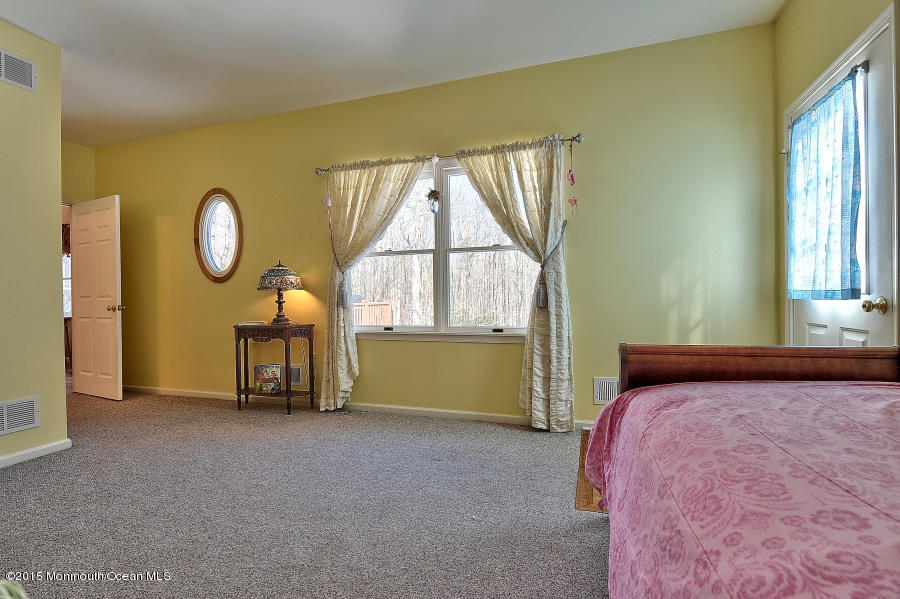 33 Larrison Road Wrightstown, NJ 08562 - Photo 30 of 35 a view of a room with furniture and a window