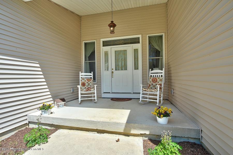 33 Larrison Road Wrightstown, NJ 08562 - Photo 3 of 35 a front view of a house with patio