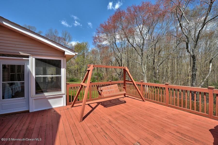 33 Larrison Road Wrightstown, NJ 08562 - Photo 31 of 35 a view of outdoor space with deck and white umbrellas