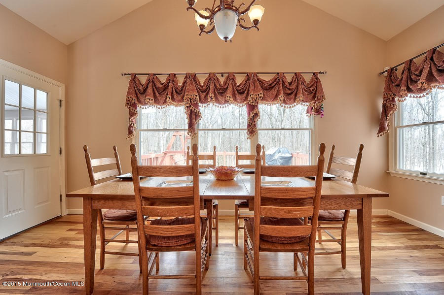 33 Larrison Road Wrightstown, NJ 08562 - Photo 10 of 35 a view of a dining room with furniture and wooden floor