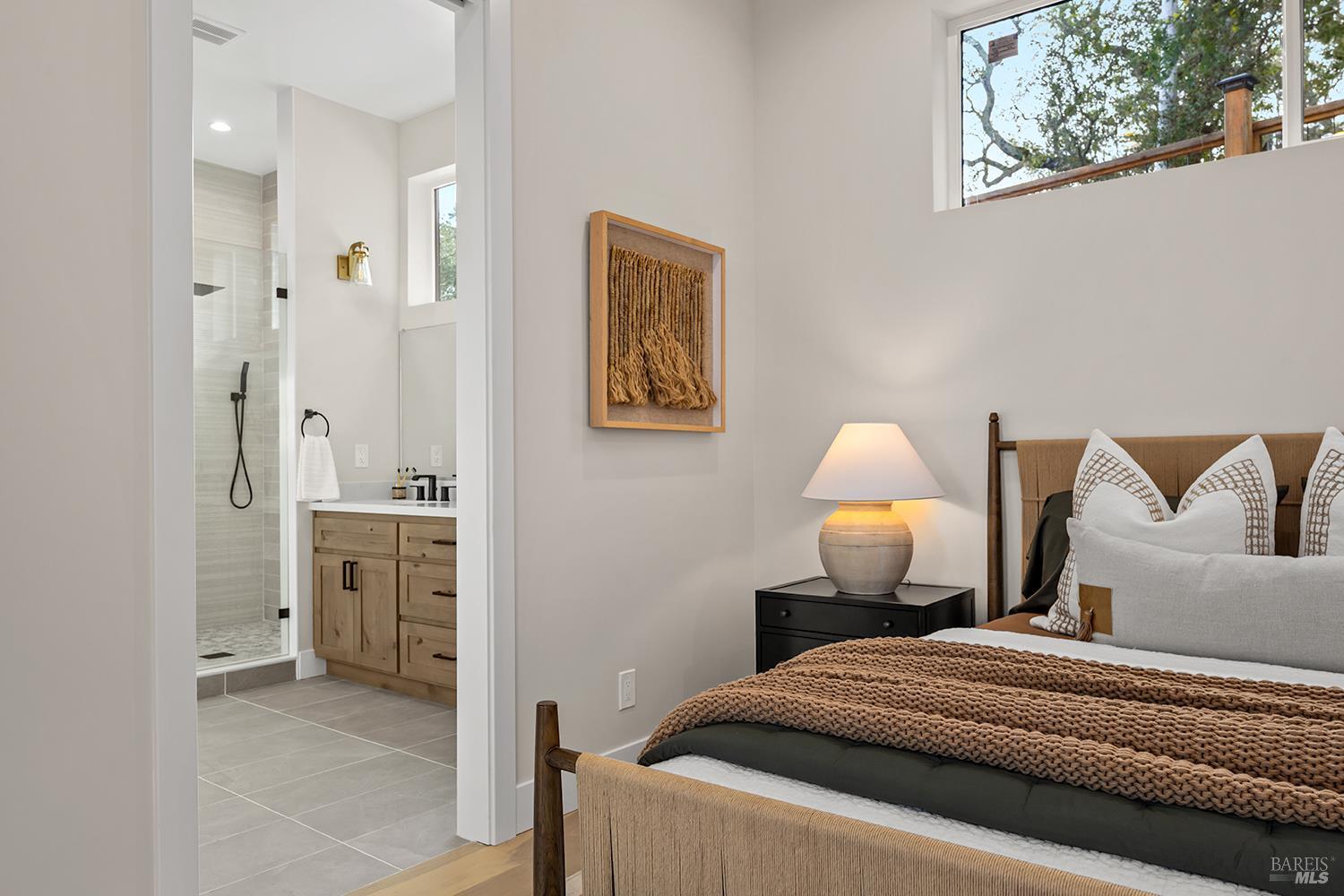 745 Redwood Road San Anselmo, CA 94960 - Photo 20 of 47 a bedroom with a bed and a lamp