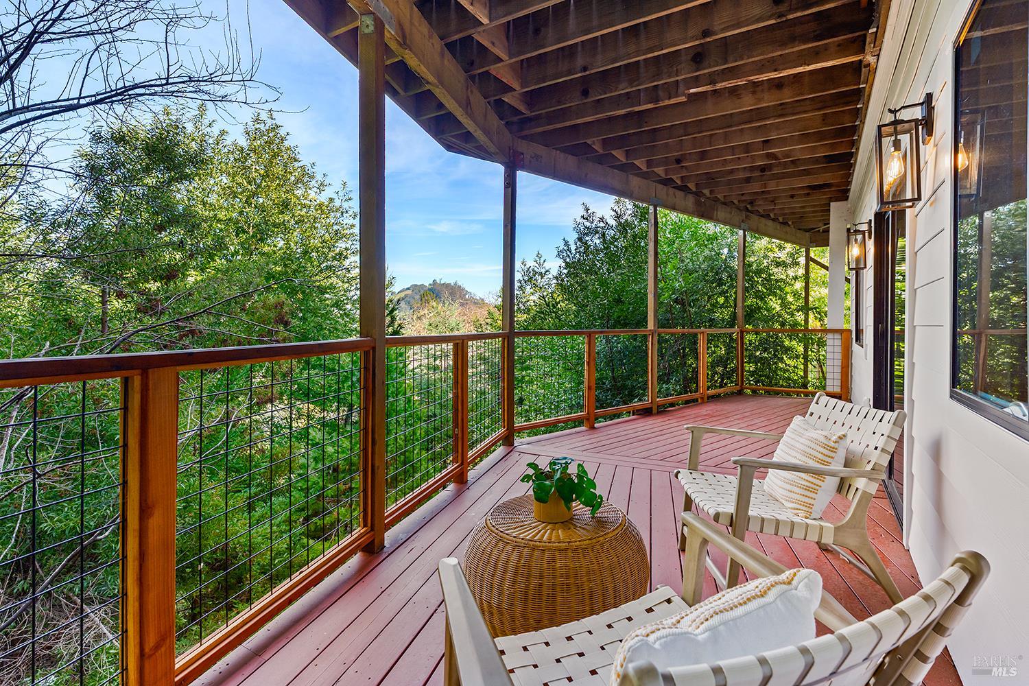745 Redwood Road San Anselmo, CA 94960 - Photo 29 of 47 a view of a patio with a table chairs and a table