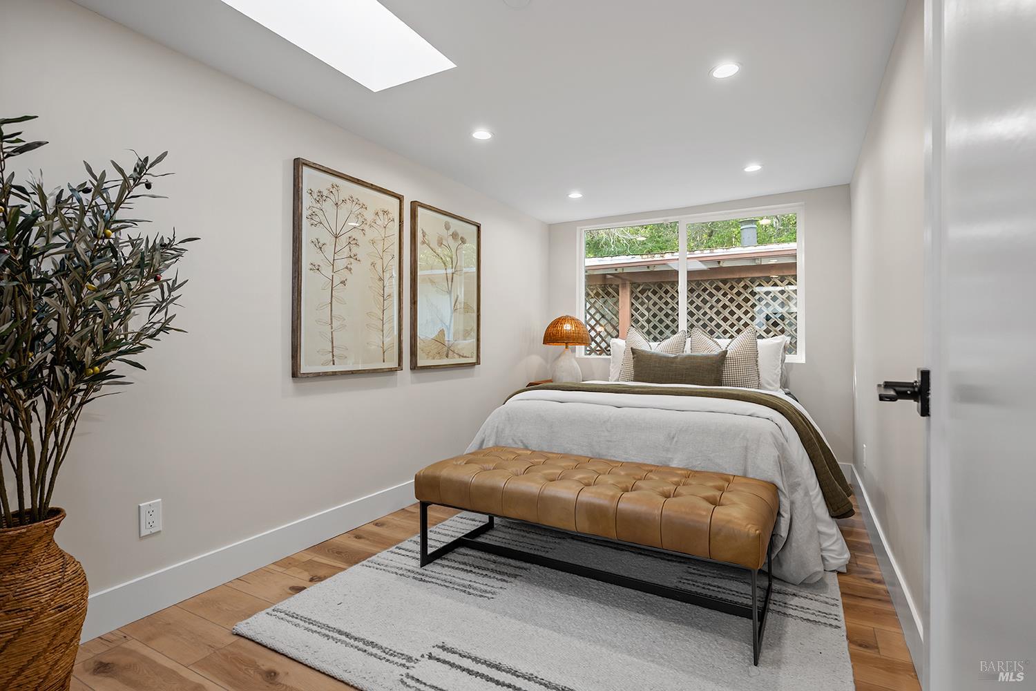 745 Redwood Road San Anselmo, CA 94960 - Photo 38 of 47 a bedroom with a bed and wooden floor