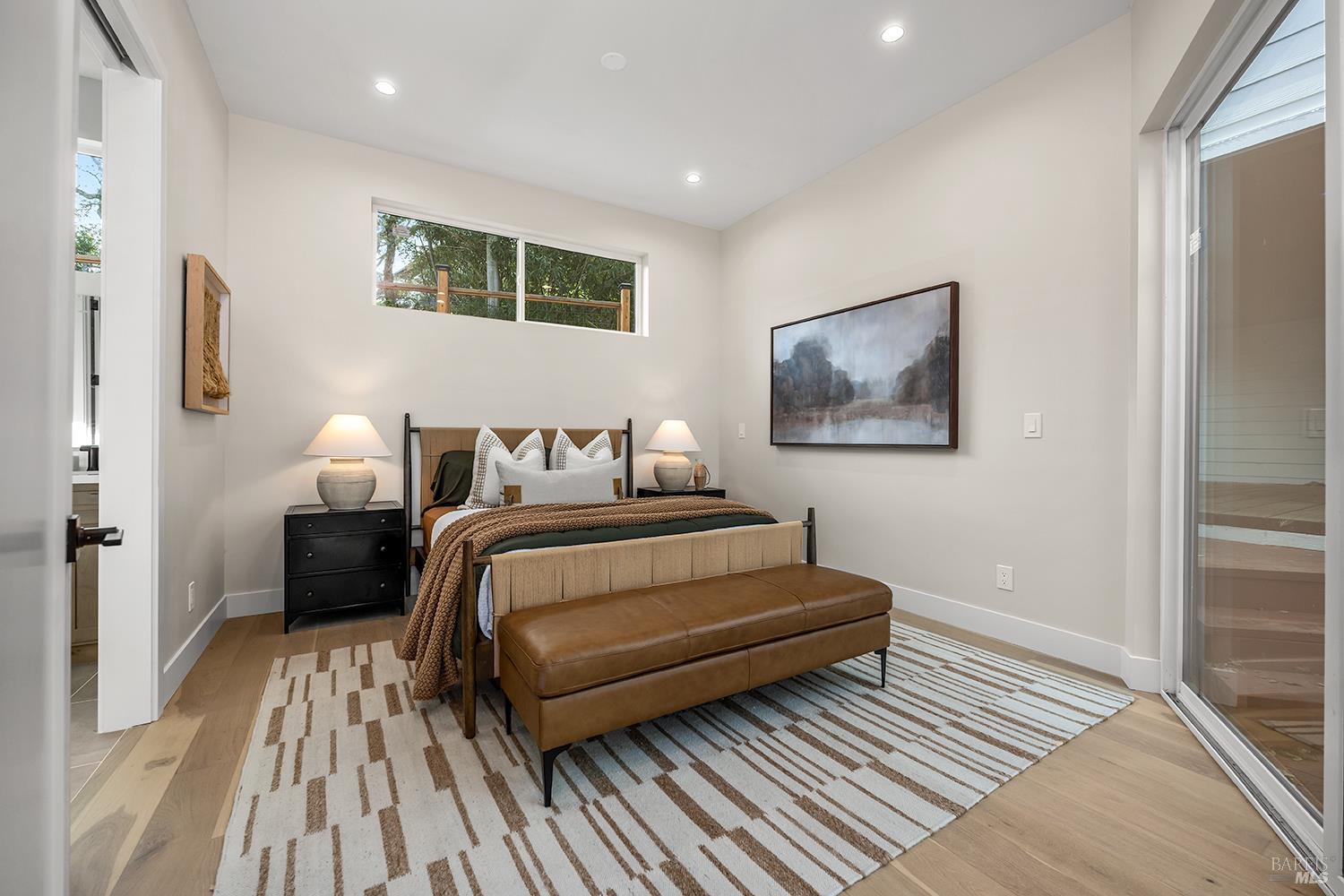 745 Redwood Road San Anselmo, CA 94960 - Photo 39 of 47 a bedroom with a bed and a night stand