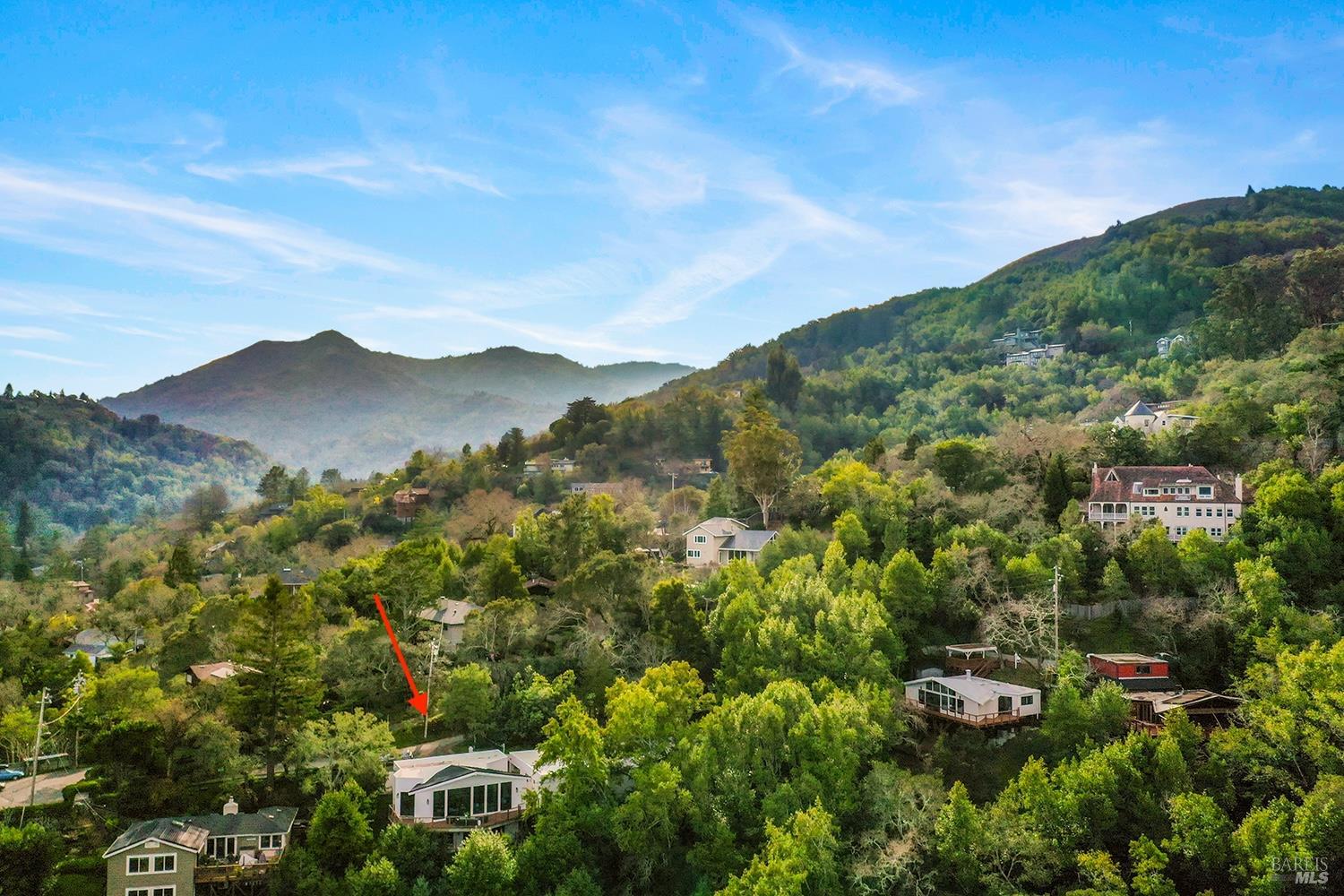 745 Redwood Road San Anselmo, CA 94960 - Photo 4 of 47 a view of a town with mountains in the background