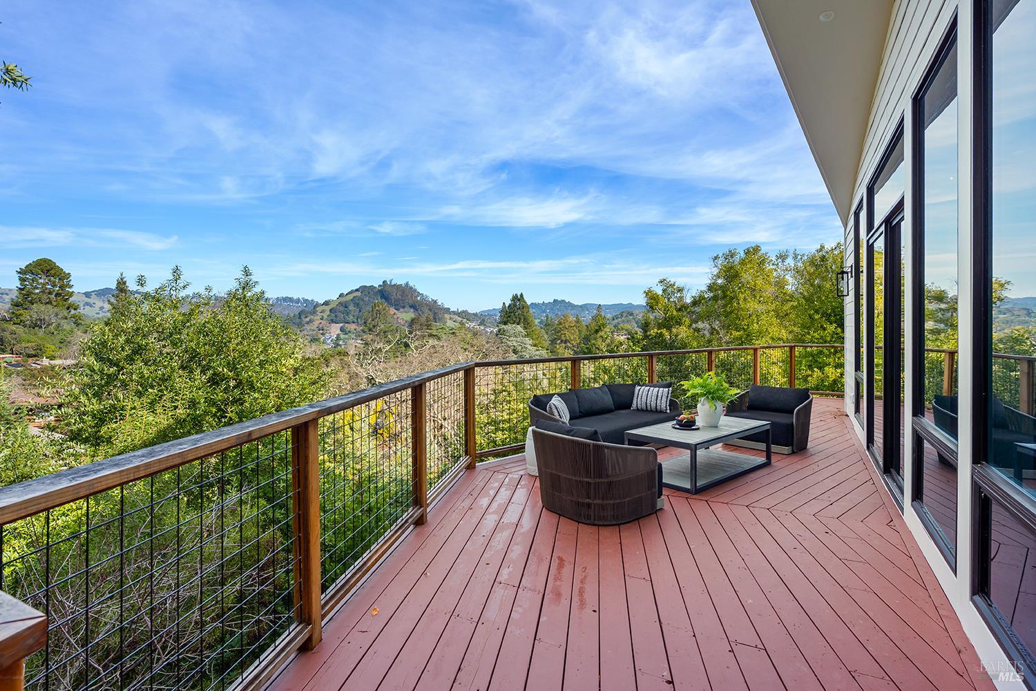 745 Redwood Road San Anselmo, CA 94960 - Photo 41 of 47 a view of a balcony with chair and wooden floor