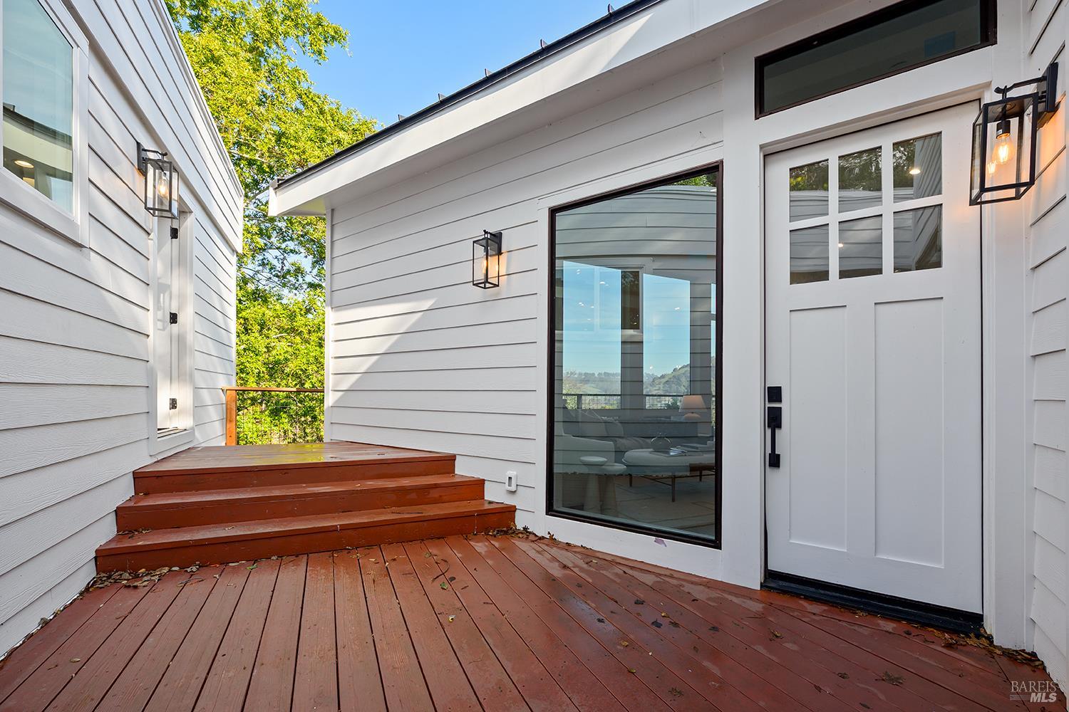 745 Redwood Road San Anselmo, CA 94960 - Photo 6 of 47 a view of a house with a door and wooden floor