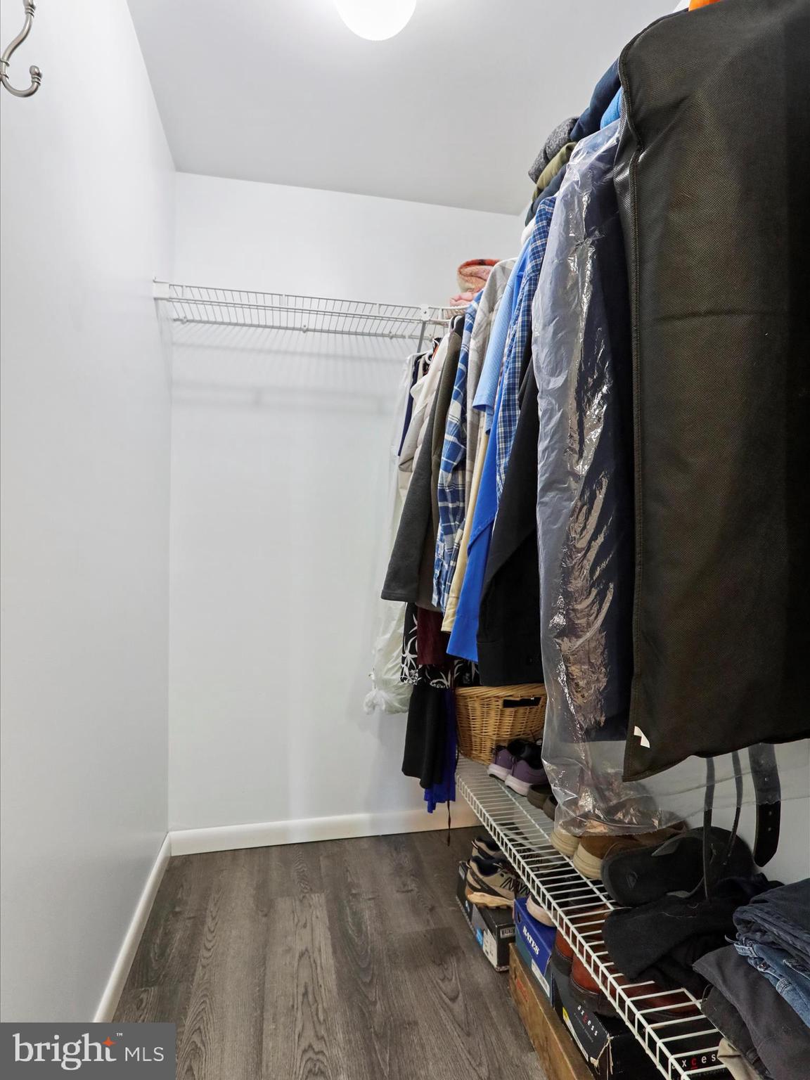 12530 Ashton Road Clear Spring, MD 21722 - Photo 13 of 57 a view of walk in closet with clothes and shoes
