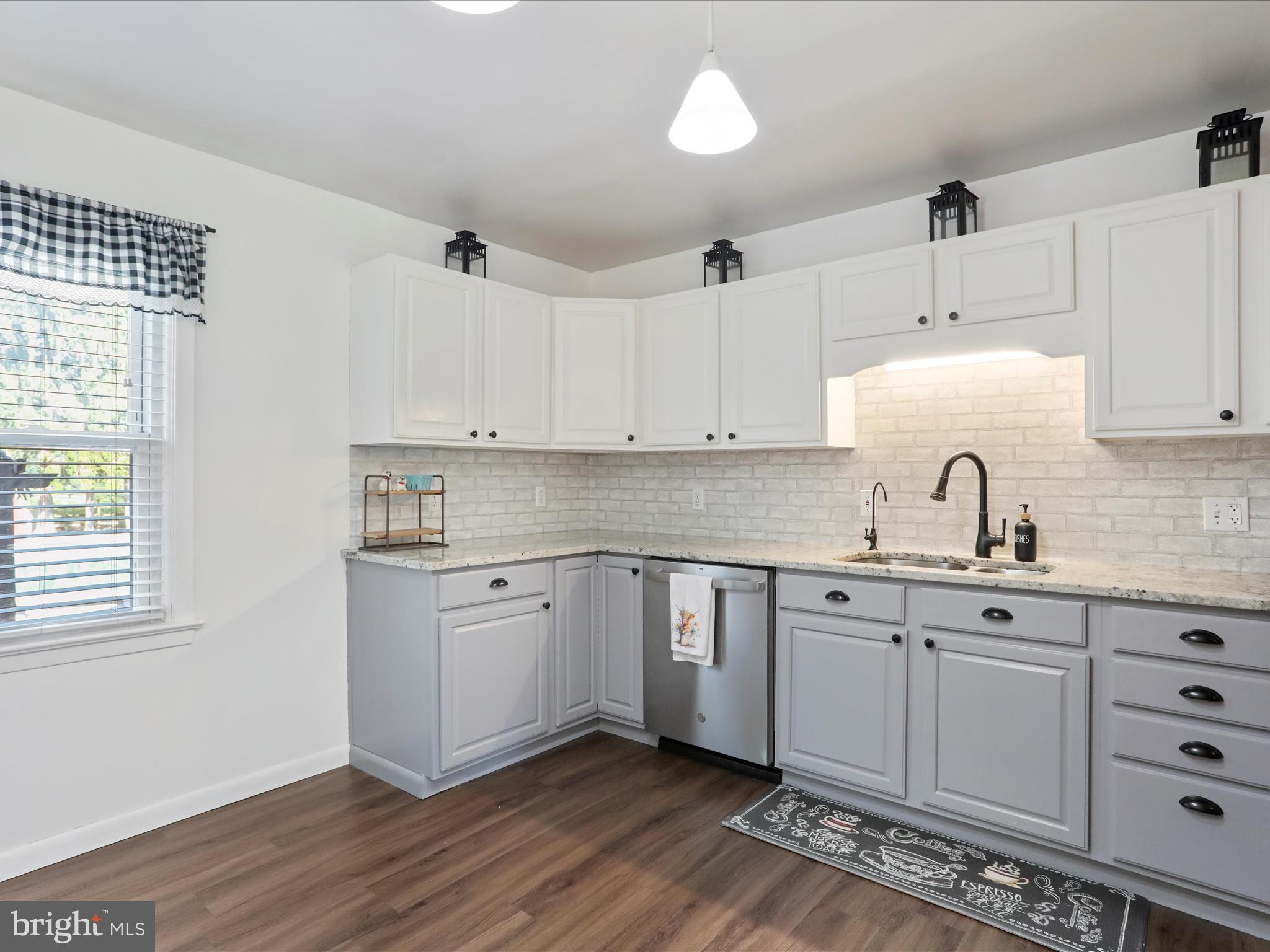 12530 Ashton Road Clear Spring, MD 21722 - Photo 14 of 57 a kitchen with a sink cabinets and window