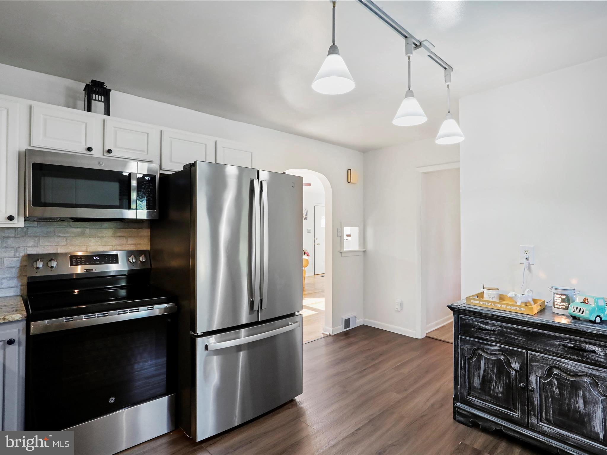 12530 Ashton Road Clear Spring, MD 21722 - Photo 18 of 57 a kitchen with stainless steel appliances a stove a refrigerator and a microwave
