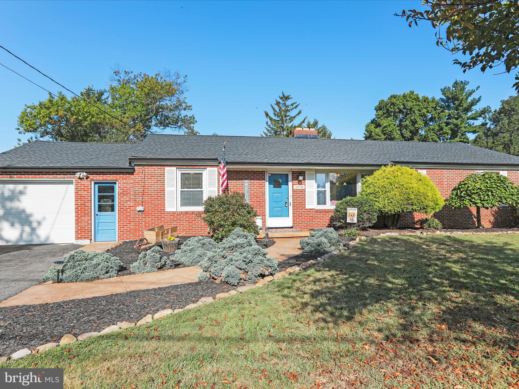 12530 Ashton Road Clear Spring, MD 21722 - Photo 2 of 57 a front view of a house with a yard