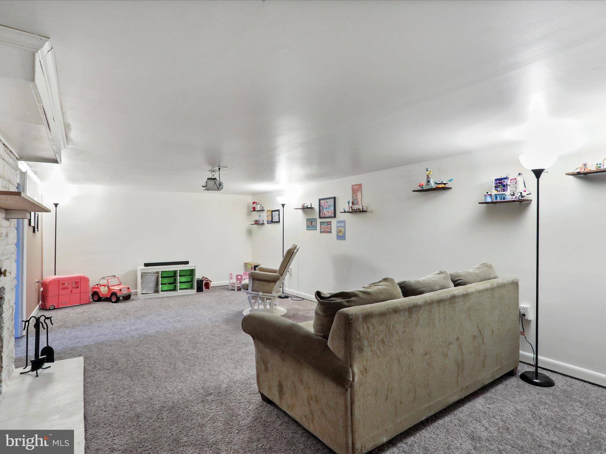 12530 Ashton Road Clear Spring, MD 21722 - Photo 29 of 57 a living room with furniture and a couch