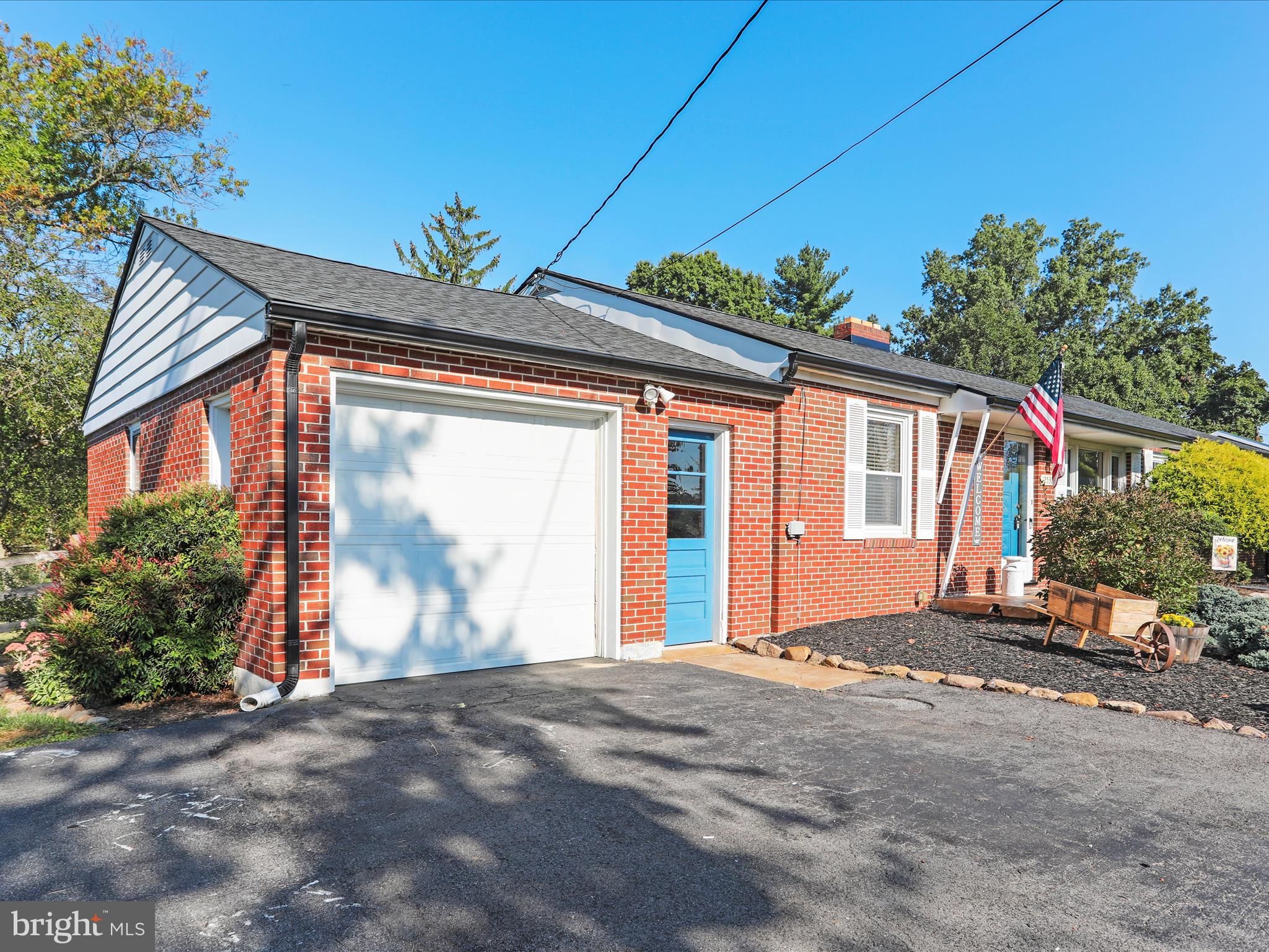 12530 Ashton Road Clear Spring, MD 21722 - Photo 3 of 57 a front view of a house with a yard