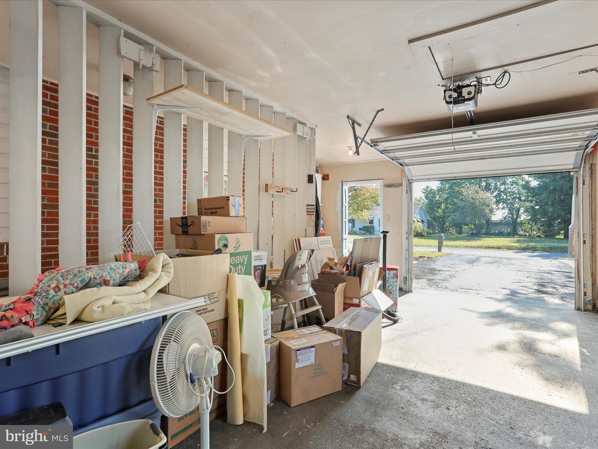 12530 Ashton Road Clear Spring, MD 21722 - Photo 35 of 57 a living room with furniture large windows and wooden floor