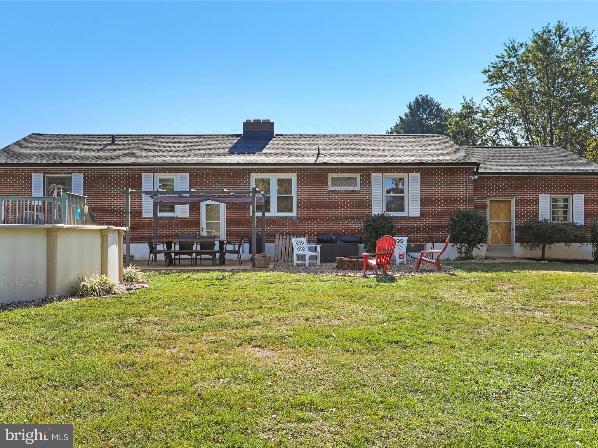 12530 Ashton Road Clear Spring, MD 21722 - Photo 44 of 57 a backyard of a house with table and chairs