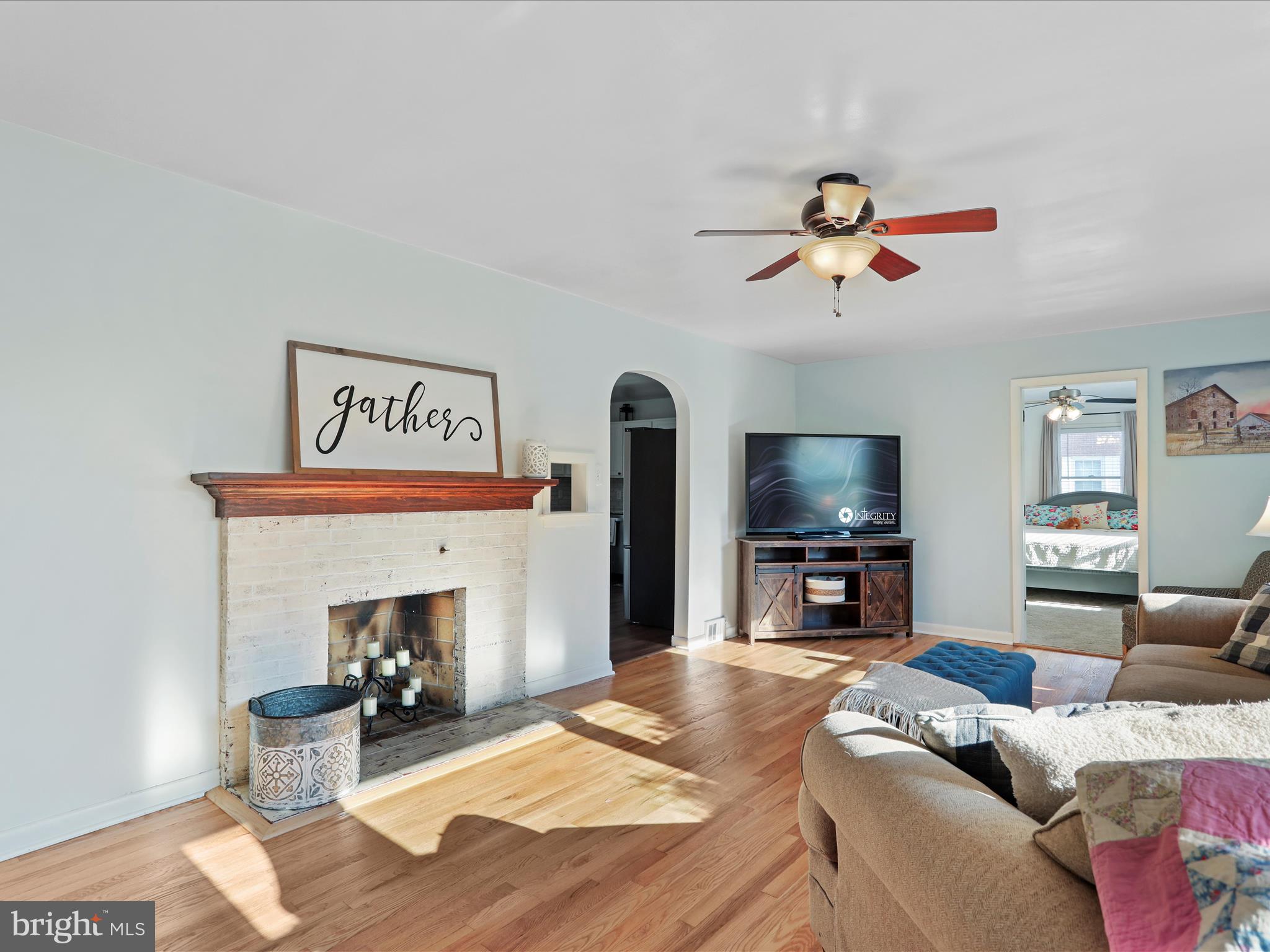 12530 Ashton Road Clear Spring, MD 21722 - Photo 5 of 57 a living room with furniture and a fireplace