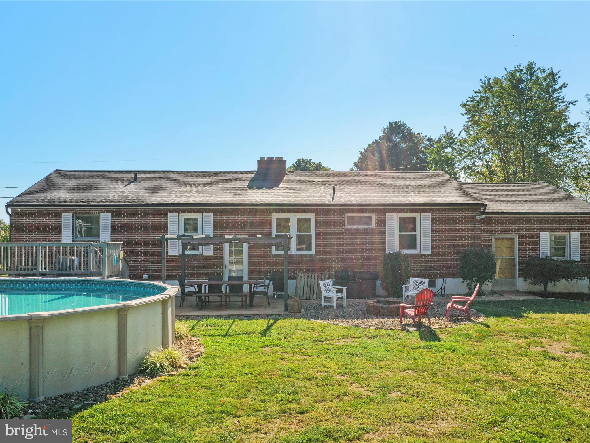 12530 Ashton Road Clear Spring, MD 21722 - Photo 56 of 57 a view of a house with pool and chairs