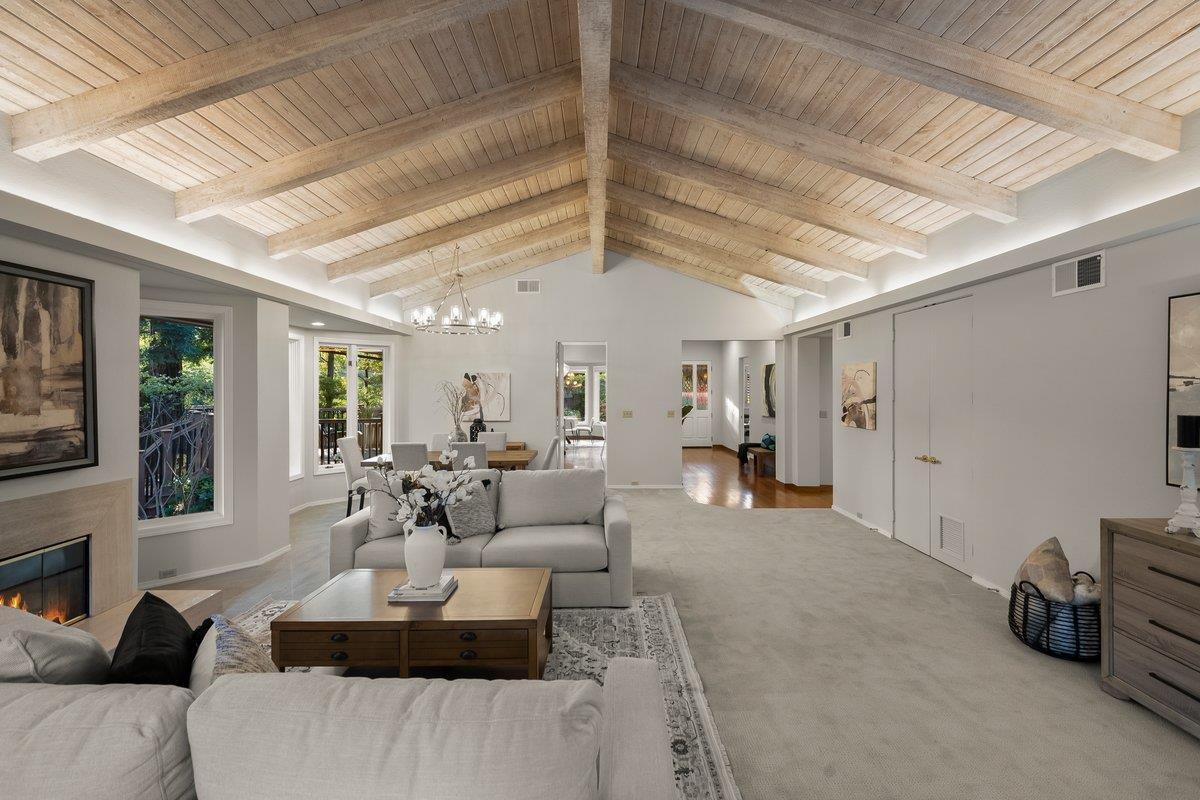 639 Morningside Road Los Altos, CA 94022 - Photo 16 of 42 a living room with furniture and a chandelier
