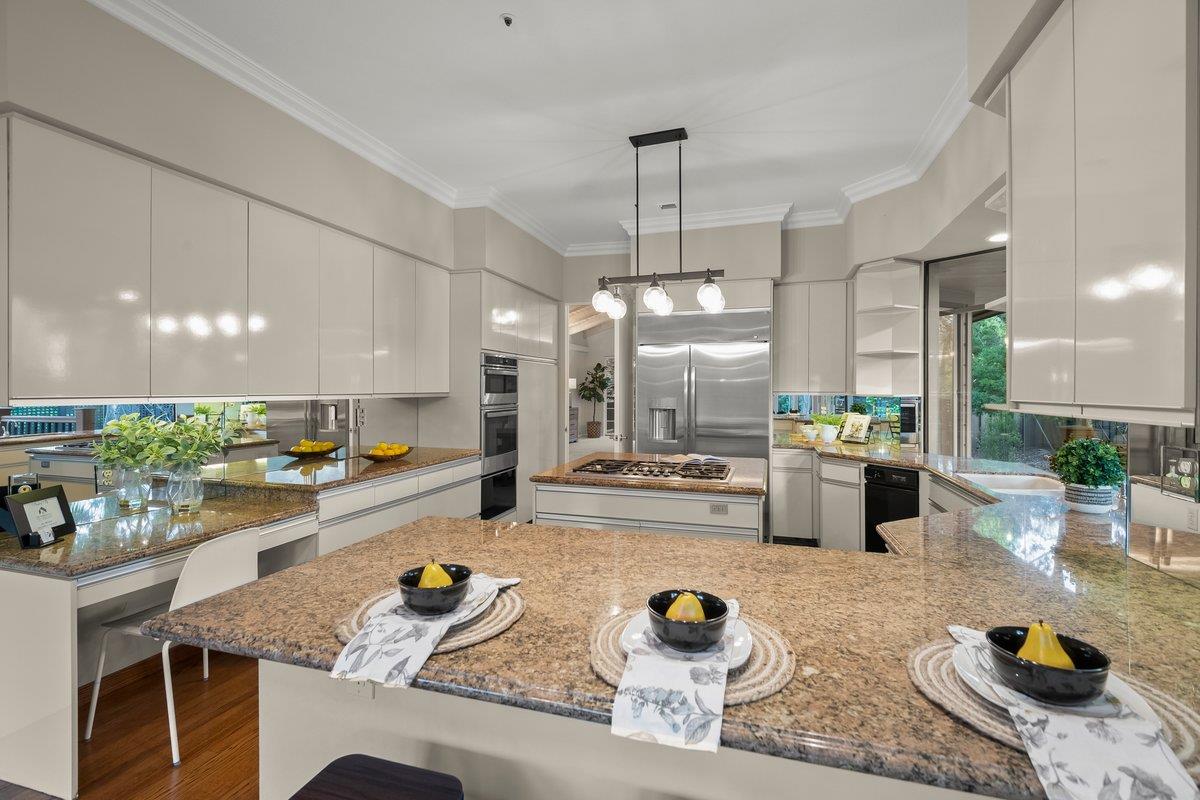639 Morningside Road Los Altos, CA 94022 - Photo 17 of 42 a kitchen with counter top space and living room view