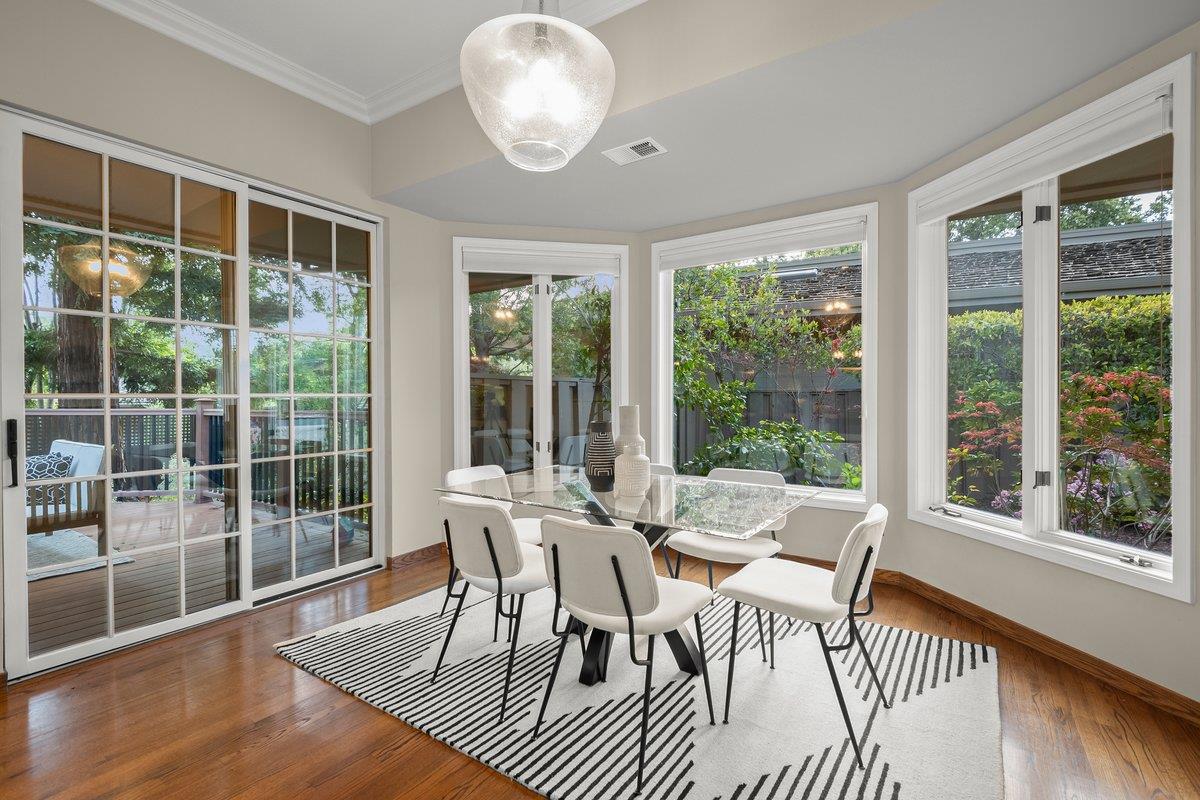 639 Morningside Road Los Altos, CA 94022 - Photo 18 of 42 a view of a dining room with furniture wooden floor and chandelier