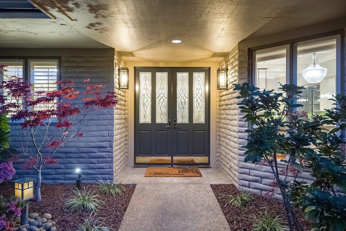 639 Morningside Road Los Altos, CA 94022 - Photo 3 of 42 a building outdoor space with patio furniture and potted plants