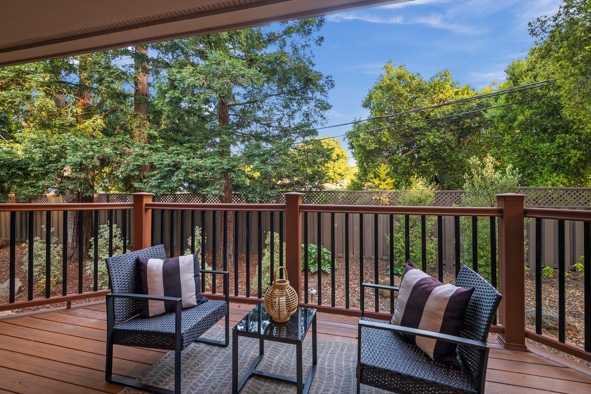 639 Morningside Road Los Altos, CA 94022 - Photo 31 of 42 a balcony with wooden floor and outdoor seating
