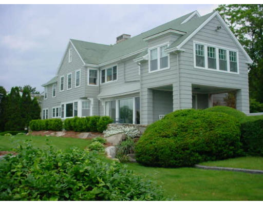 33 Links Road Gloucester, MA 01930 - Photo 2 of 9 a front view of a house with a yard