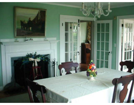 33 Links Road Gloucester, MA 01930 - Photo 6 of 9 a living room with furniture and a fireplace