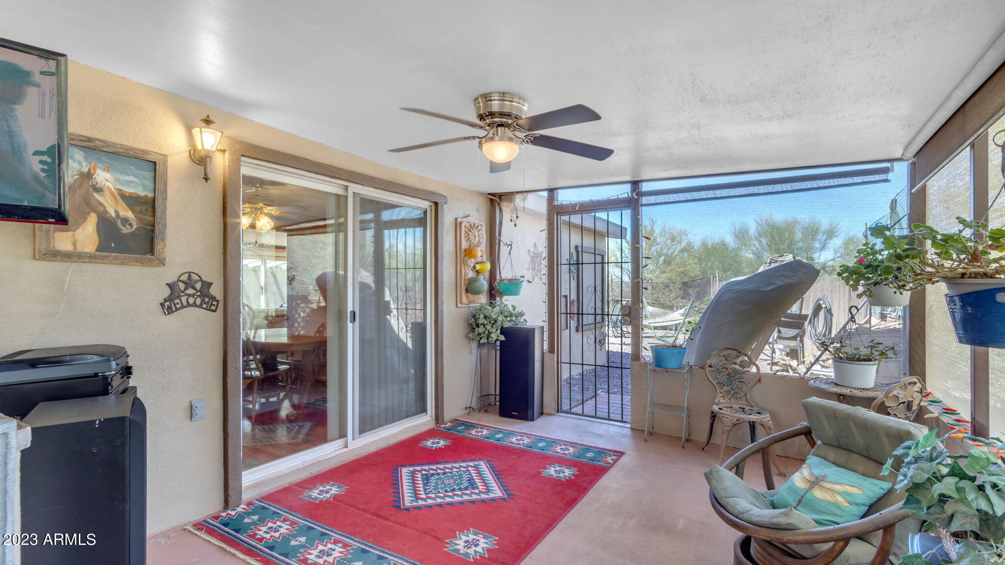 274 South Belaire Road Apache Junction, AZ 85119 - Photo 30 of 47 Enclosed, Covered Back Patio