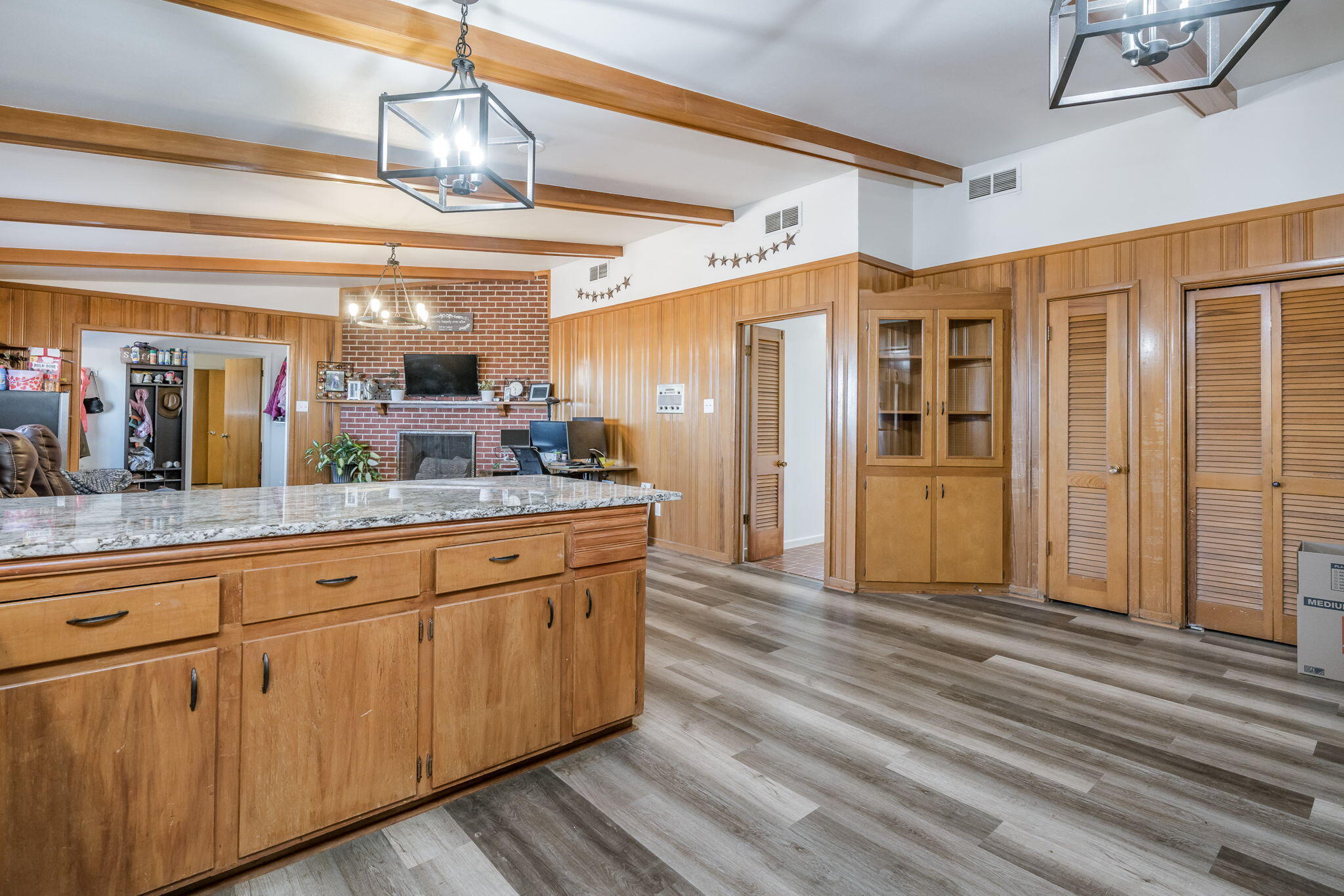1723 County Road 9 Tulia, TX 79088 - Photo 11 of 32 a spacious bathroom with a granite countertop sink and a mirror