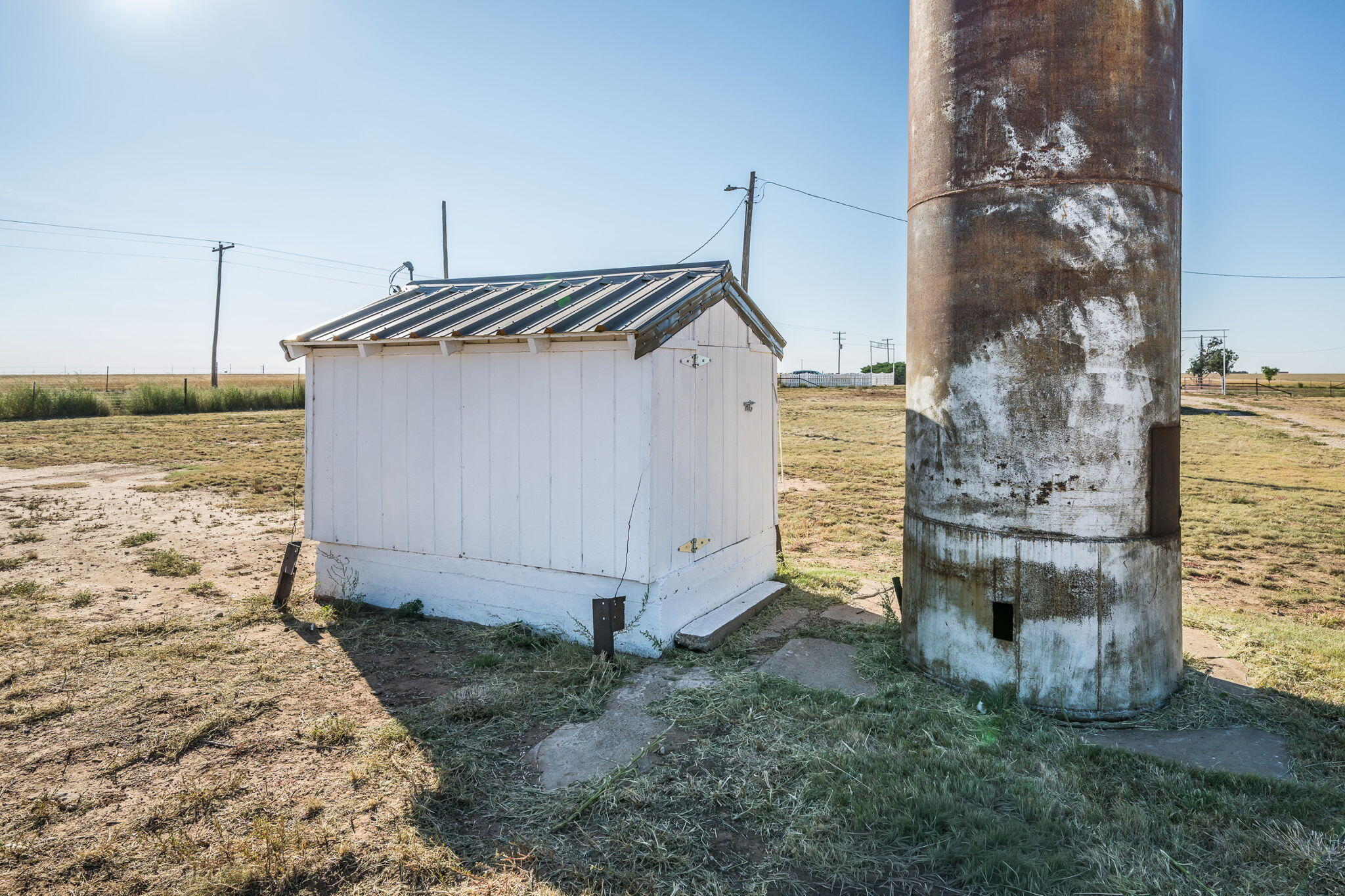 1723 County Road 9 Tulia, TX 79088 - Photo 28 of 32 a view of a house with a yard