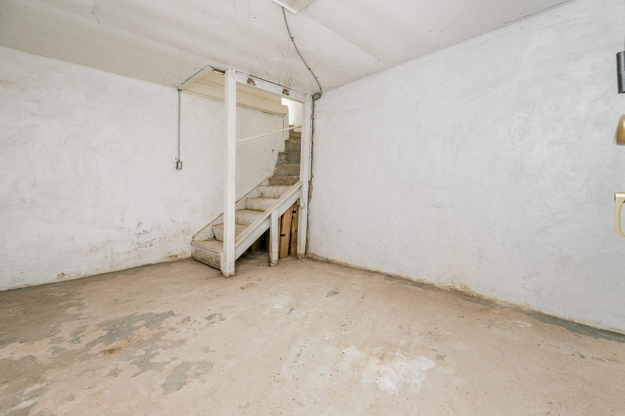 1723 County Road 9 Tulia, TX 79088 - Photo 32 of 32 a view of a room with stairs and closet