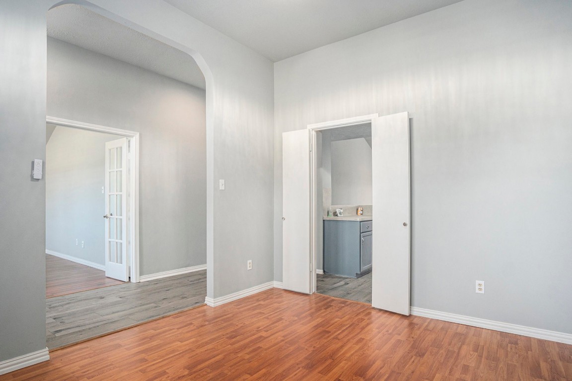 3315 Mourning Dove Drive Spring, TX 77388 - Photo 11 of 44 a view of an empty room with wooden floor & closet
