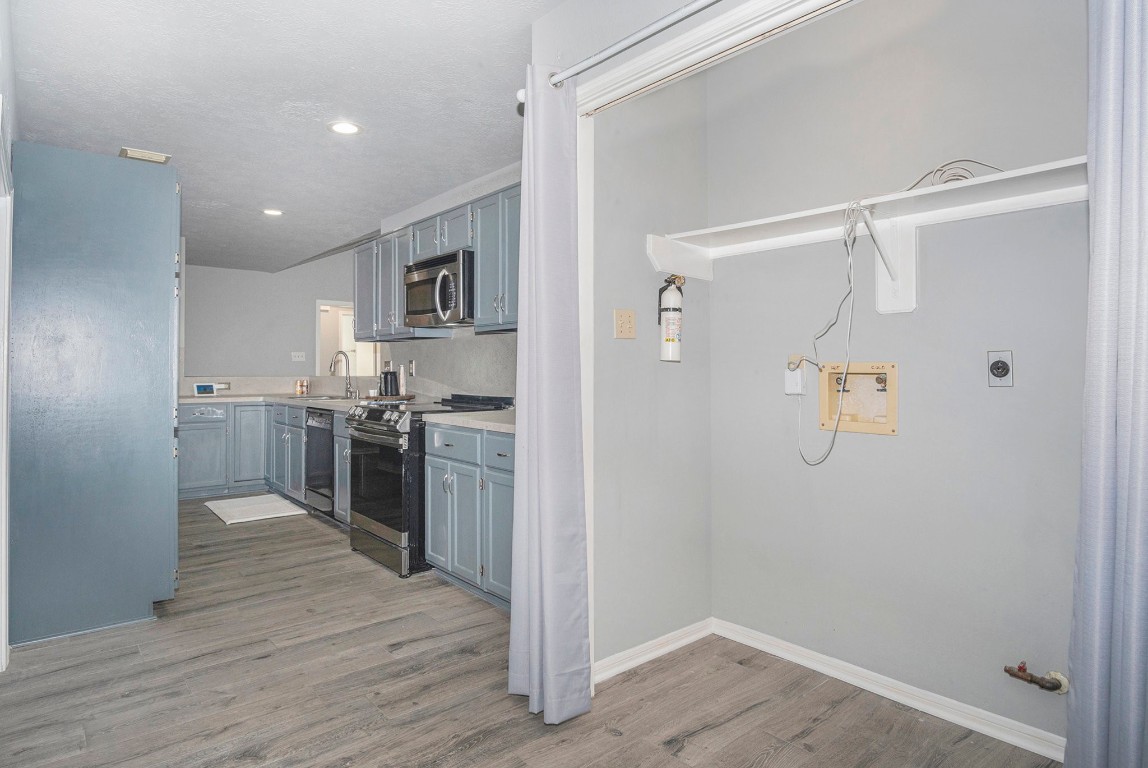 3315 Mourning Dove Drive Spring, TX 77388 - Photo 21 of 44 a kitchen with a refrigerator and a sink