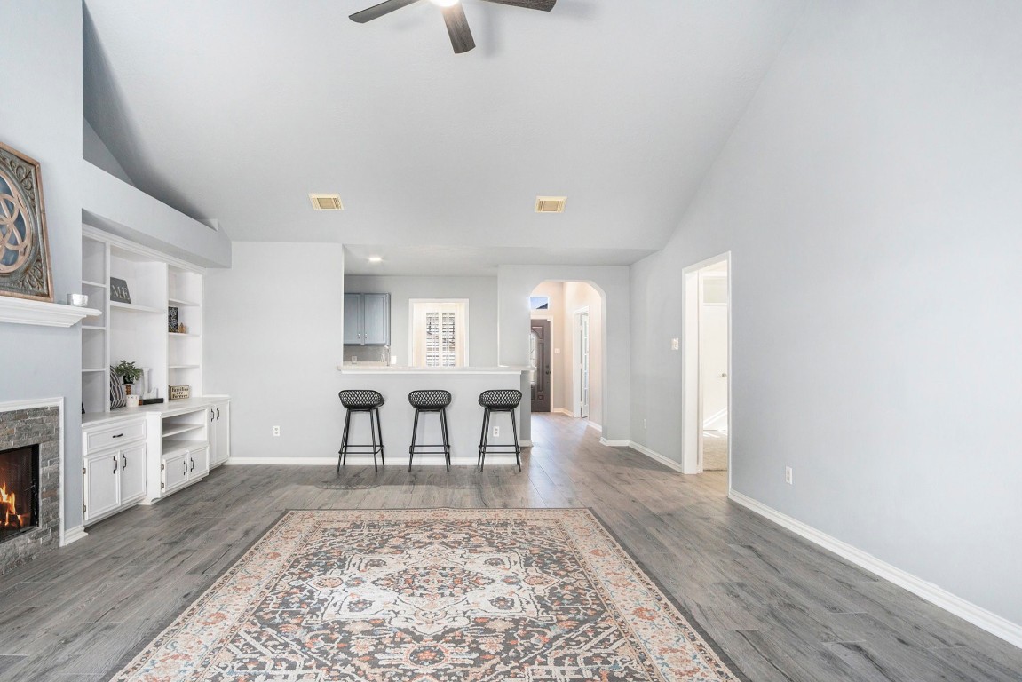 3315 Mourning Dove Drive Spring, TX 77388 - Photo 27 of 44 a view of a livingroom with furniture a fireplace wooden floor and windows