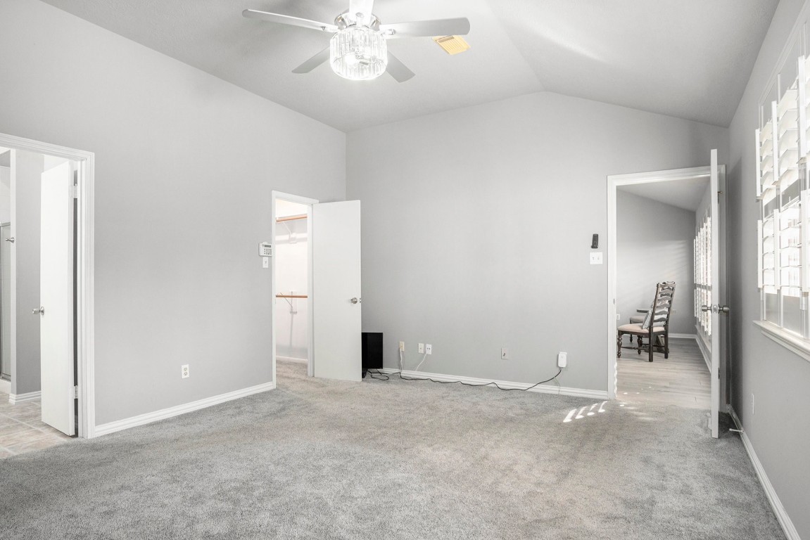 3315 Mourning Dove Drive Spring, TX 77388 - Photo 29 of 44 an empty room with chandelier fan and windows