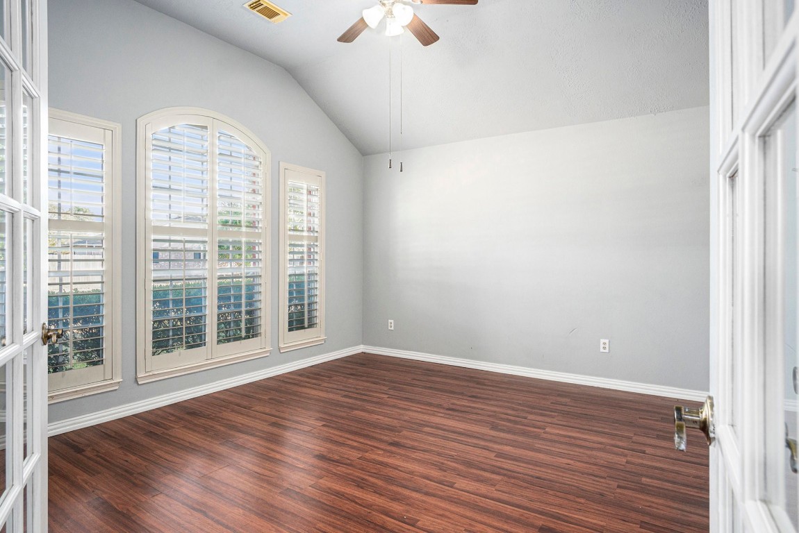 3315 Mourning Dove Drive Spring, TX 77388 - Photo 8 of 44 a view of an empty room with wooden floor and a window