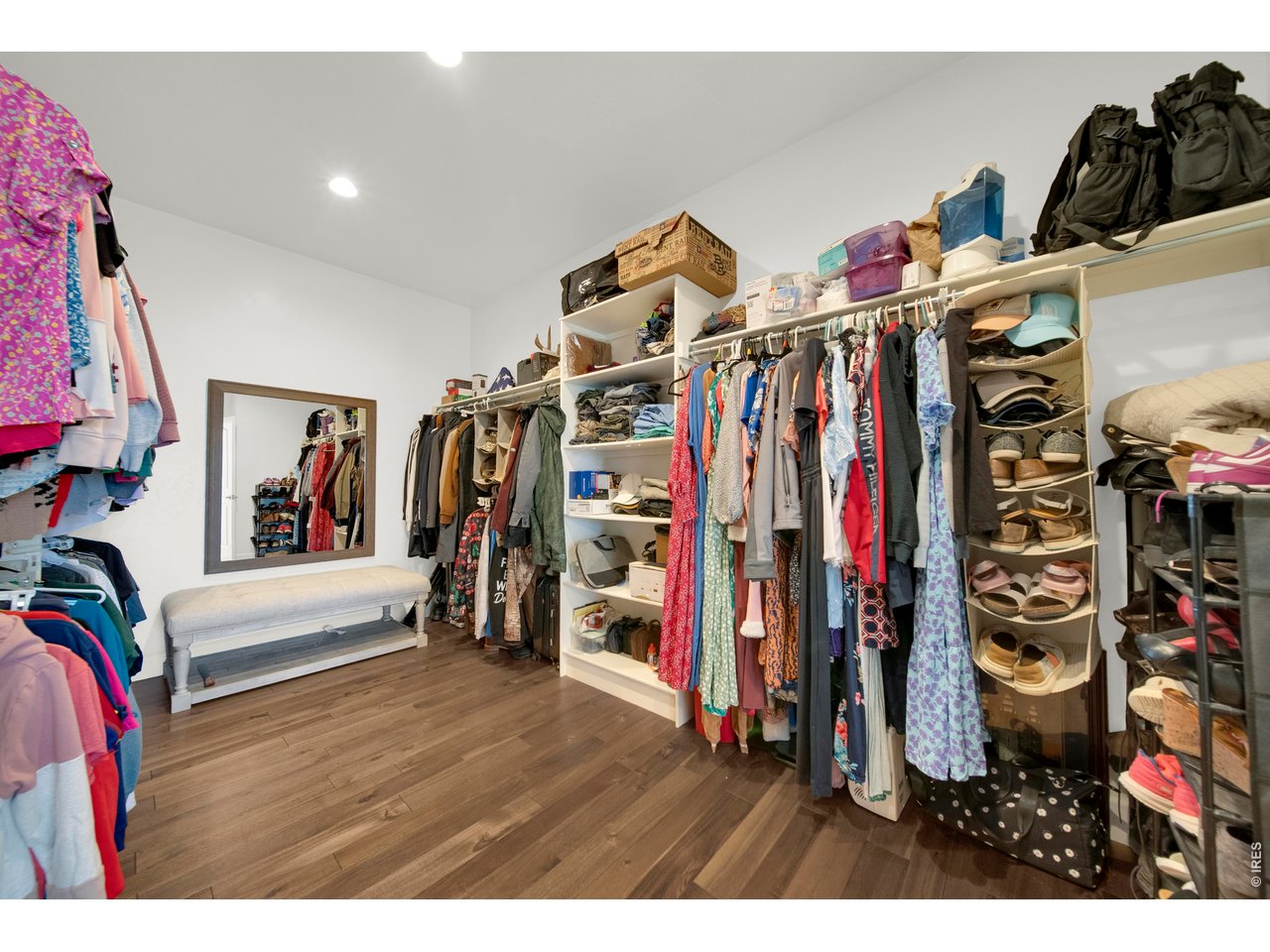 20138 State Highway 52, Unit 5 Fort Morgan, CO 80701 - Photo 24 of 50 a view of walk in closet with clothes and shoes