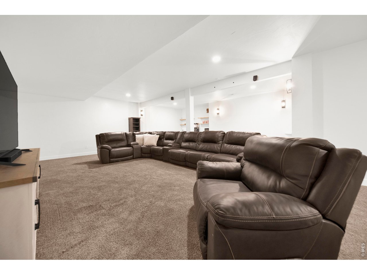 20138 State Highway 52, Unit 5 Fort Morgan, CO 80701 - Photo 31 of 50 a living room with furniture and a couch