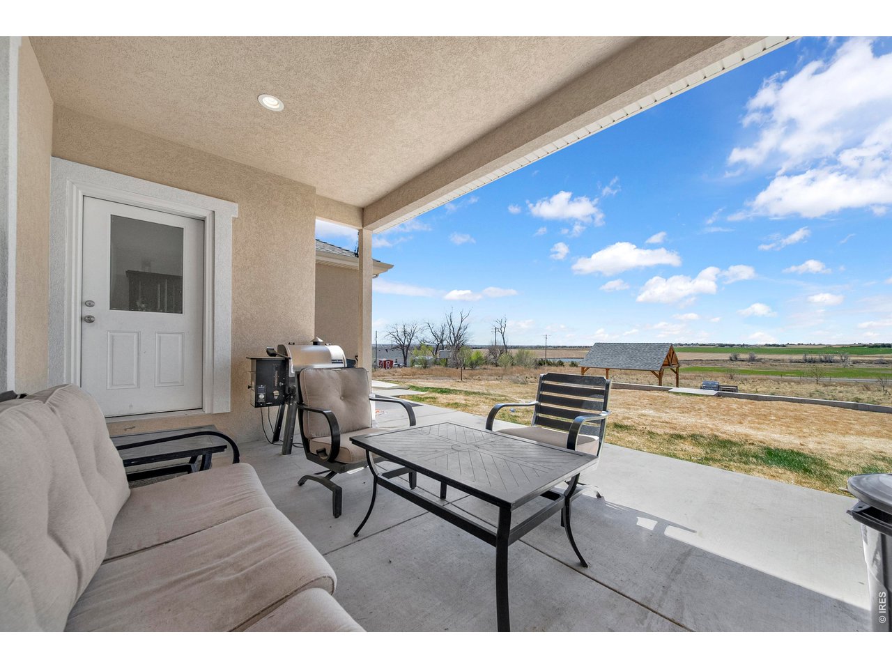 20138 State Highway 52, Unit 5 Fort Morgan, CO 80701 - Photo 41 of 50 a living room with furniture and a large window