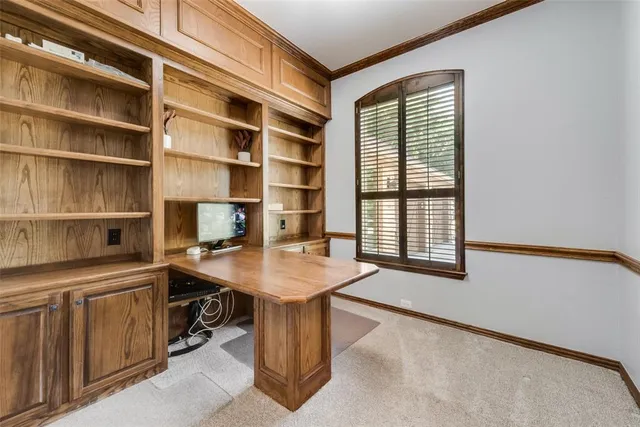 a view of a workspace with furniture