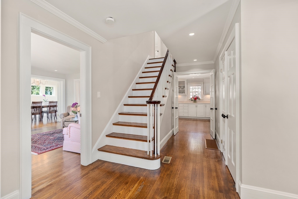 125 Rutledge Road Belmont, MA 02478 - Photo 4 of 40 a view of a hallway with wooden floor and entryway