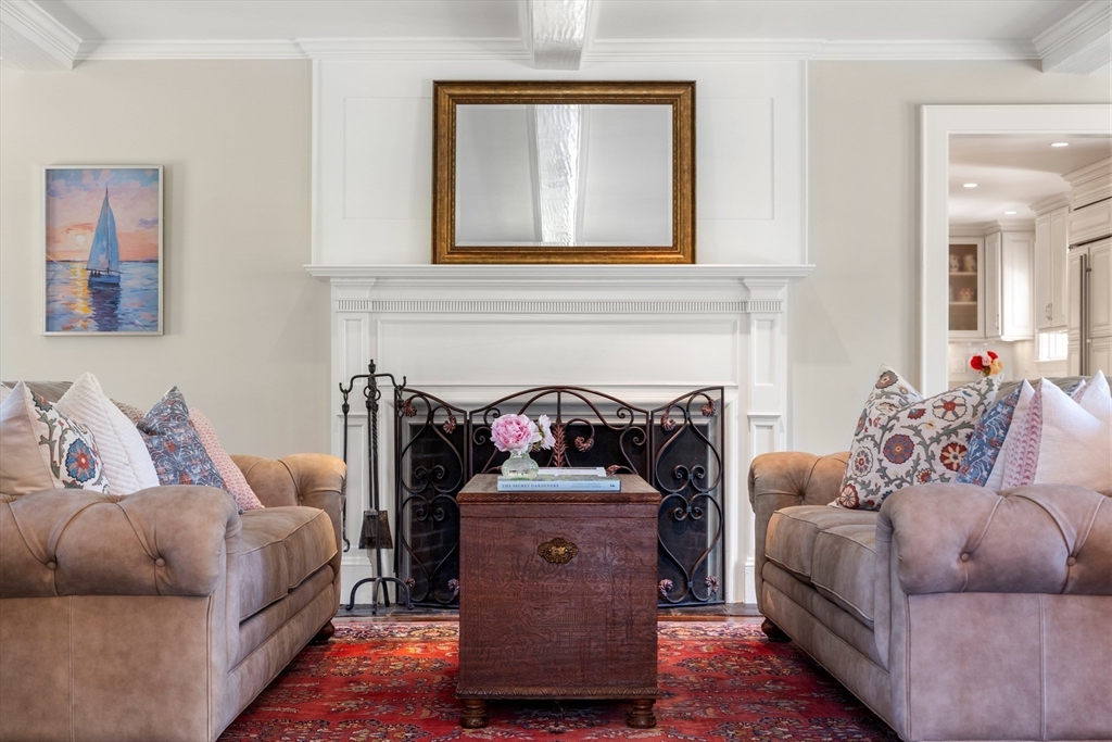 125 Rutledge Road Belmont, MA 02478 - Photo 8 of 40 a living room with furniture and a fireplace