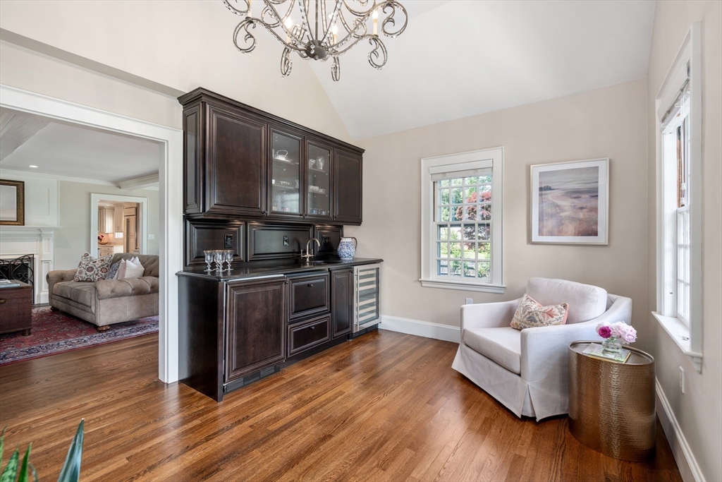 125 Rutledge Road Belmont, MA 02478 - Photo 10 of 40 a living room with furniture and a flat screen tv