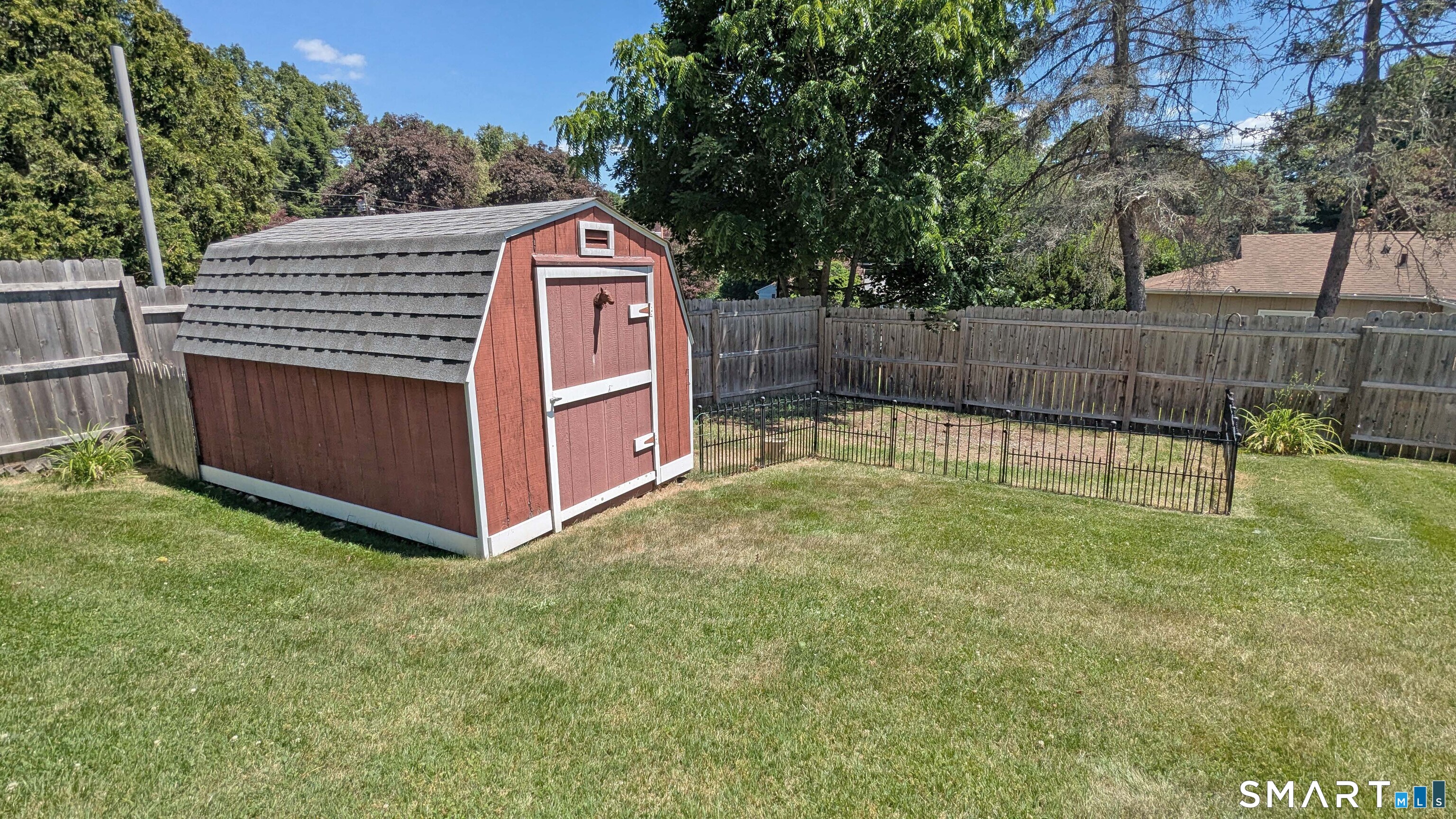 65 Prout Hill Road Middletown, CT 06457 - Photo 30 of 31 Useful storage shed and a fenced off vegetable garden